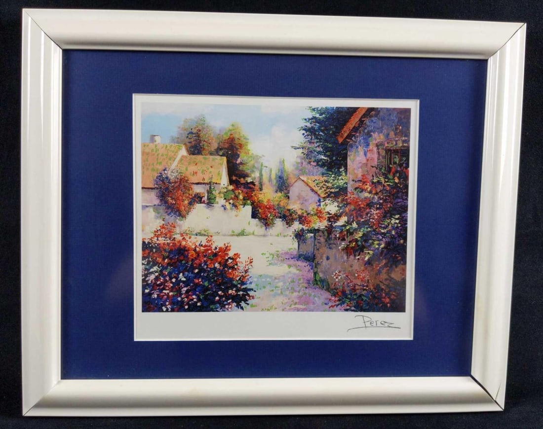Alex Perez Framed Village View III Lithograph: "Village View III". Framed Lithograph print of a European country village with flowers by Alex Perez. Framed art is signed by the artist on the bottom right. Is approx 16" x 13".