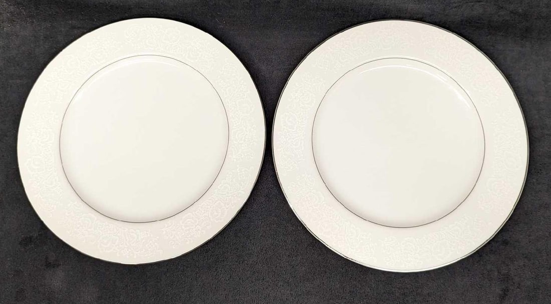 2 Retired International Fine China Juliet Dinner Plates C: 2 Retired International Fine China Juliet Dinner Plates C. Each plate is approx 7 5/8" x 7 5/8" x 3/4" and the total weight is 2.58 lbs. The plates do not have any chips or cracks, and there are some 
