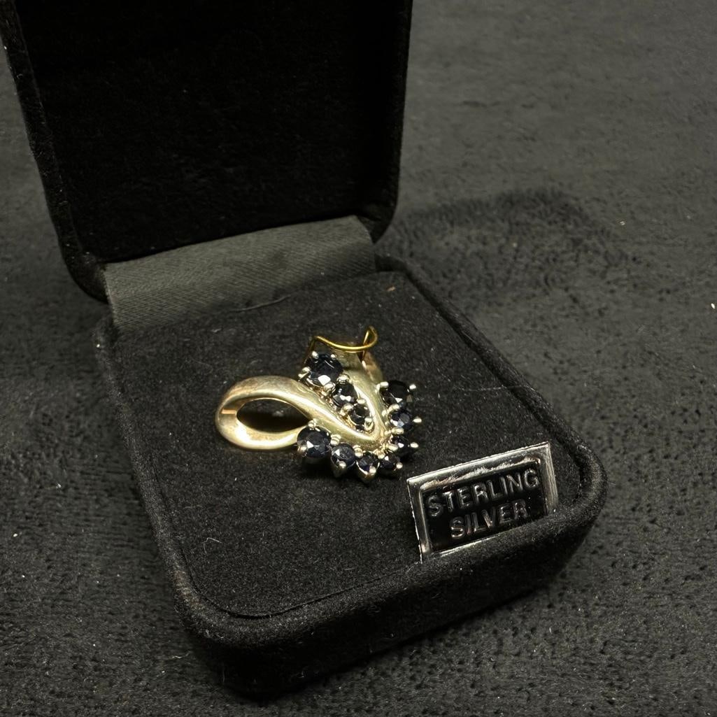 Sterling Silver & Sapphire Pendant: This piece of jewelry has been tested and researched prior to listing. Please view all our pictures they are part of our description. DETAILS: Metal - Sterling Silver Color - Silver Stones - Sapphire 