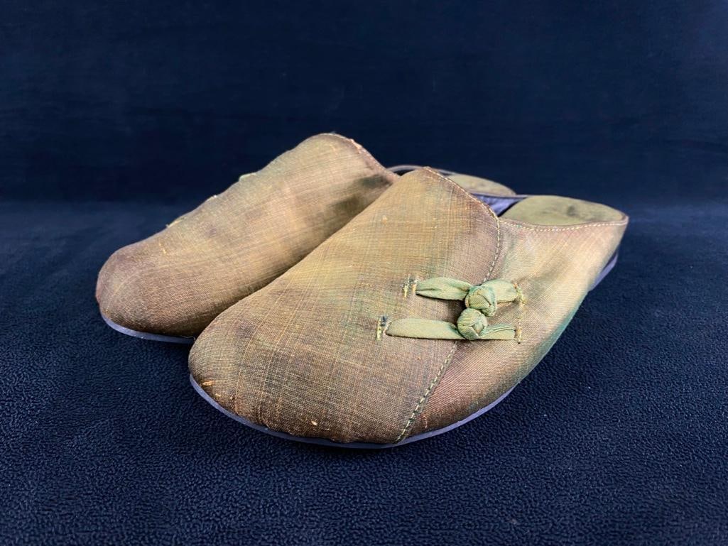 Vietnamese Green Silk Slippers: Vietnamese Green Silk Slippers Green silk slippers made in Vietnam, appear to have barely been worn if at all. No wear on the tread, and the silk is still extremely bright and shiny. They are Vietname