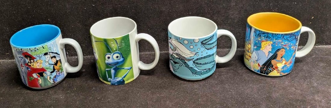 Disney Ceramic Mugs Sleeping Beauty Bug's Life Little Mermaid Pocahontas: Disney Ceramic Mugs Sleeping Beauty Bug's Life Little Mermaid Pocahontas This lot includes: (1) Pocahontas Mug.This is approx 3 1/2" x 4 3/4" x 3 1/2". (1) Little Mermaid - Ursul