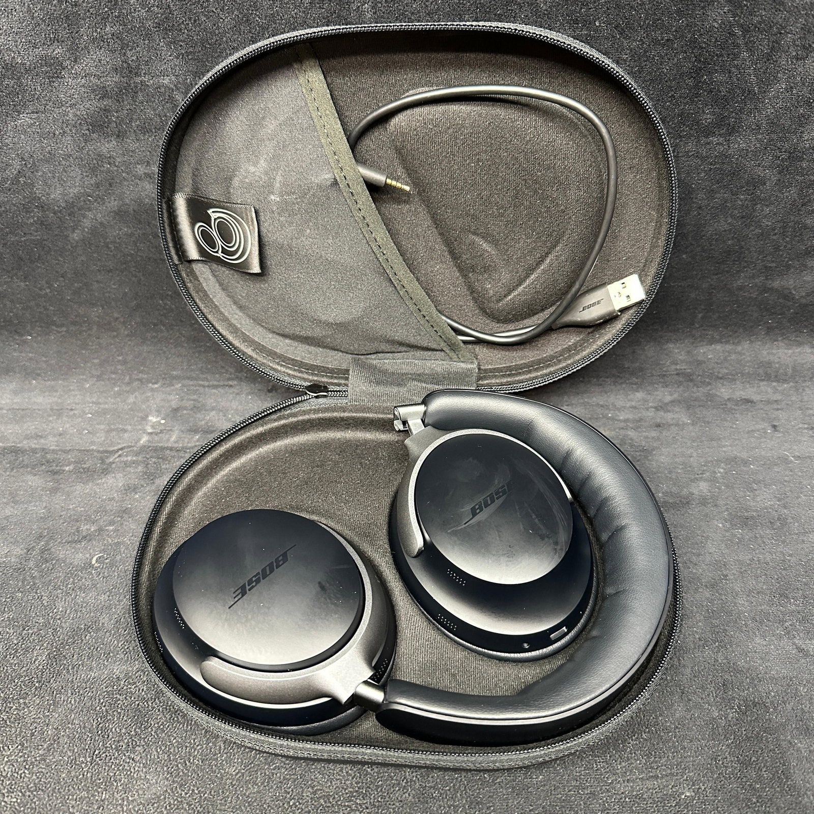 Bose QuietComfort Ultra Wireless Noise Cancelling Headphones With Case: Tested, fully functional, Bluetooth. Bose over-ear wireless noise-cancelling headphones with carrying case, USB charging cable, and audio cable. Headphones show light cosmetic wear from previous use. 