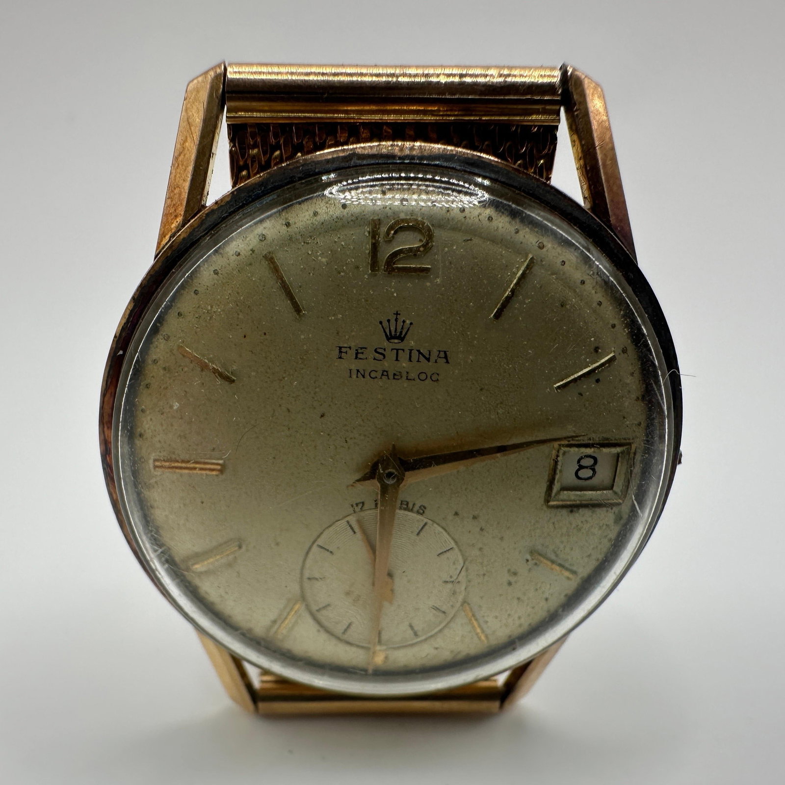Festina 18K Gold Manual Wind Wristwatch With Mesh Band: Vintage Festina Incabloc wristwatch with signed dial, manual wind 17 jewel movement, date display, and small seconds subdial. Watch case back marked 18K 0.750 and mesh band and bezel test as 18K gold.