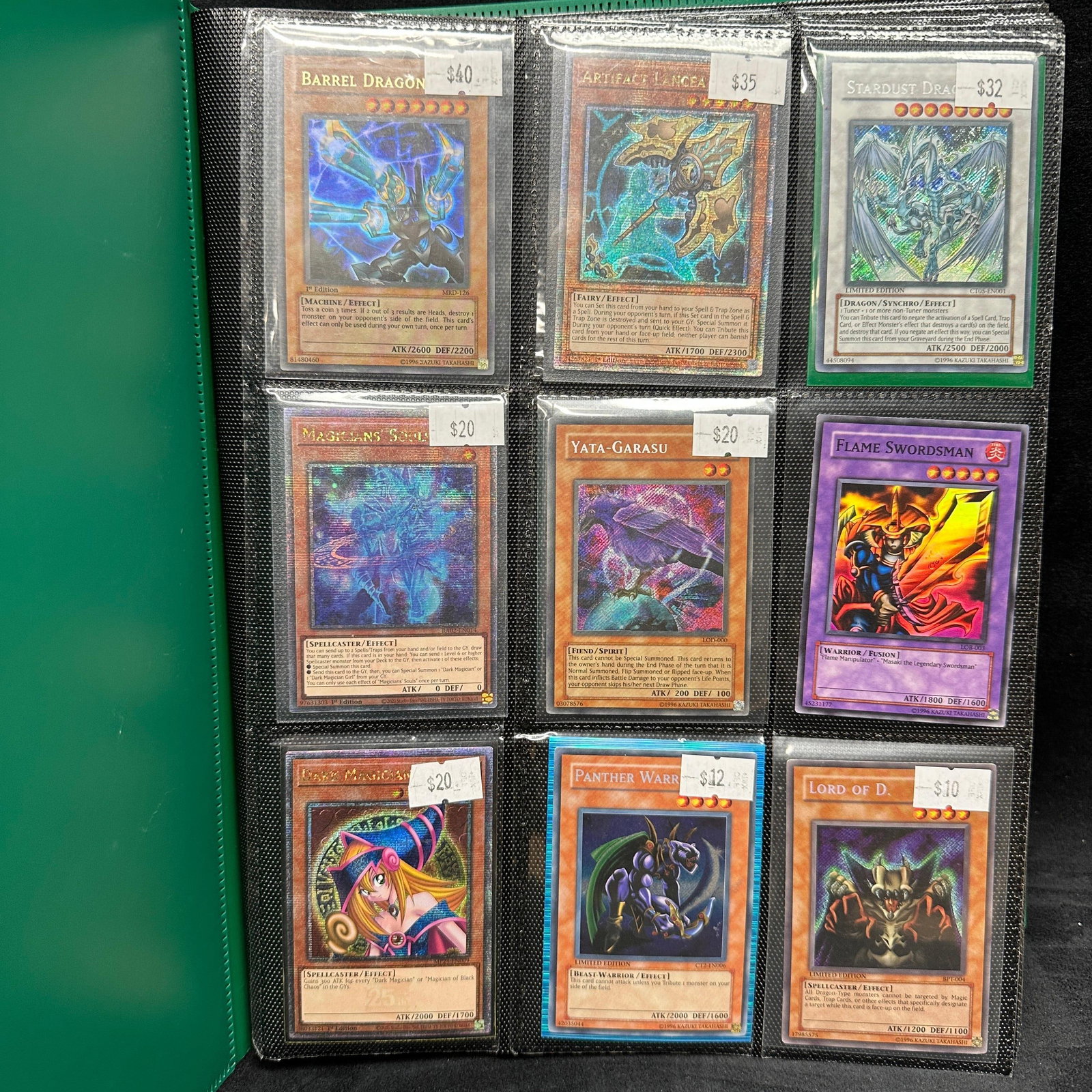 Large Yu-Gi-Oh Trading Card Binder Collection With Dark Magician Girl Blue-Eyes Obelisk and More: Large Yu-Gi-Oh trading card binder collection featuring holographic, ultra rare, secret rare, limited edition, fusion, synchro, XYZ, and effect monster cards. 206 Cards total and 5 promo packs with mu