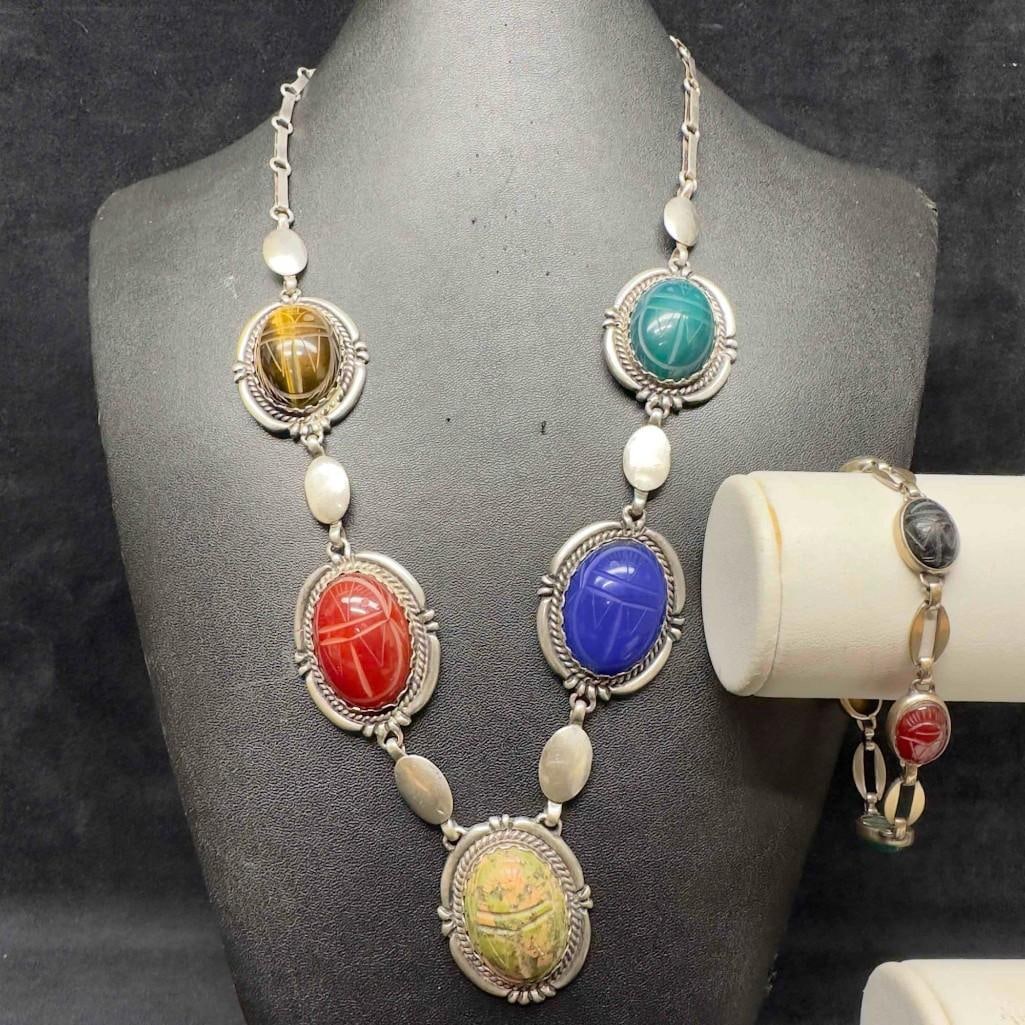 Scarab Beetle Egyptian Hieroglyphs Gemstone Sterling Silver Bracelet and Necklace Set Ten Gemstones: These pieces of jewelry have been tested and researched prior to listing. Please view all our pictures as they are part of our description. DETAILS: Metal - Sterling Silver Color - Silver Stones - Yes