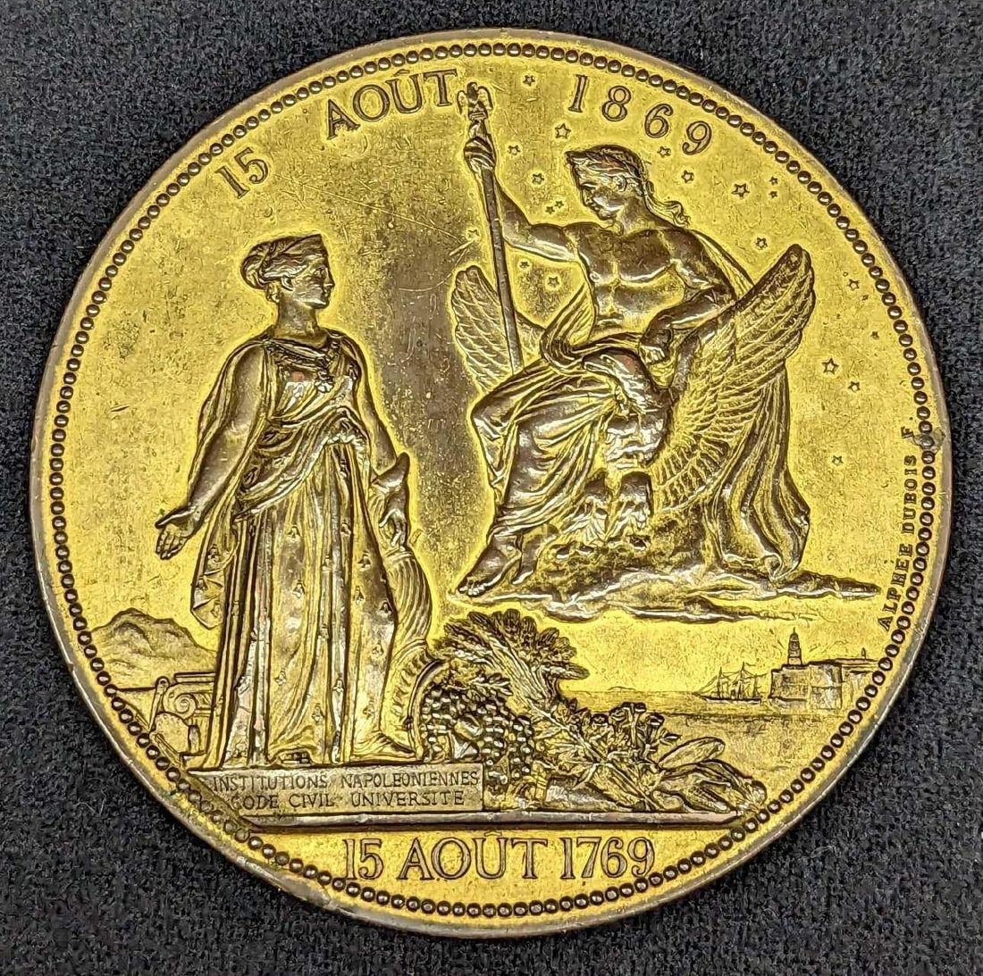 1970s Napoleon Centenary 1869 Medal: 1970s Napoleon Centenary 1869 Medal. Based on a design by Alphée Dubois. Made of bronze. This is approx 3 7/8" x 3 7/8" x 1/4" and it weighs 0.50lb. The medal has some wear and tarnish.