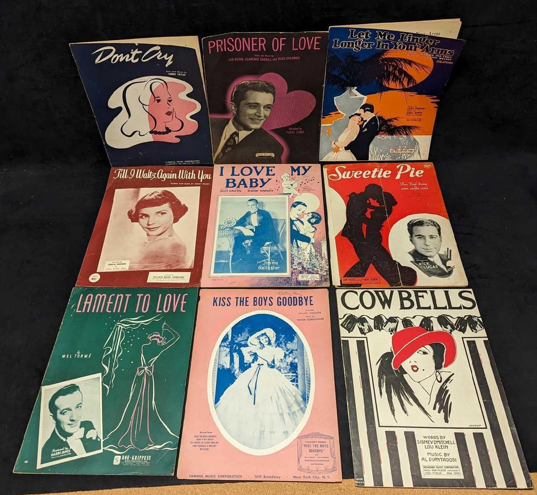 9 Vintage Love Sheet Music: This was copyrighted in 1941.. This lot includes: (1) Lament To Love. This was copyrighted in 1941. (1) Kiss The Boys Goodbye. This was copyrighted in 1941. The pages are loose and ripped.