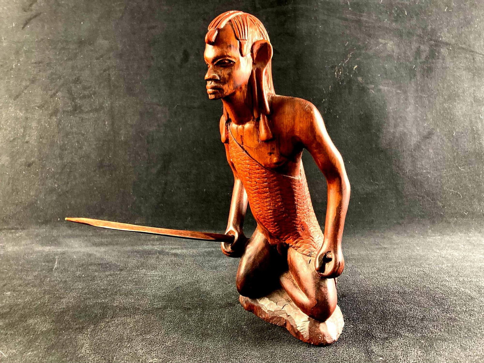 Aboriginal Wooden Warrior Display: This lot includes: (1) Aboriginal Wooden Warrior Display Condition is used and see photographs for additional details. The figure is wooden and depicts an aboriginal warrior. He is holding a spear
