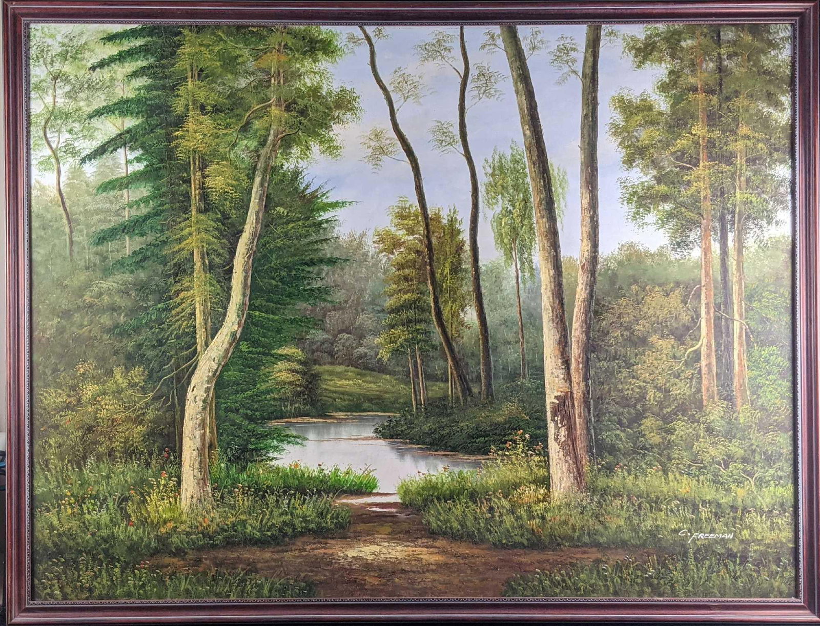 Original Large Oil On Canvas C Freeman Landscape: Original framed oil on canvas of a small pond and trees. Was signed by the artist on the bottom right. The original is approx 50" x 1" x 39" and it weighs 6lbs. The framed original is in a good, used 