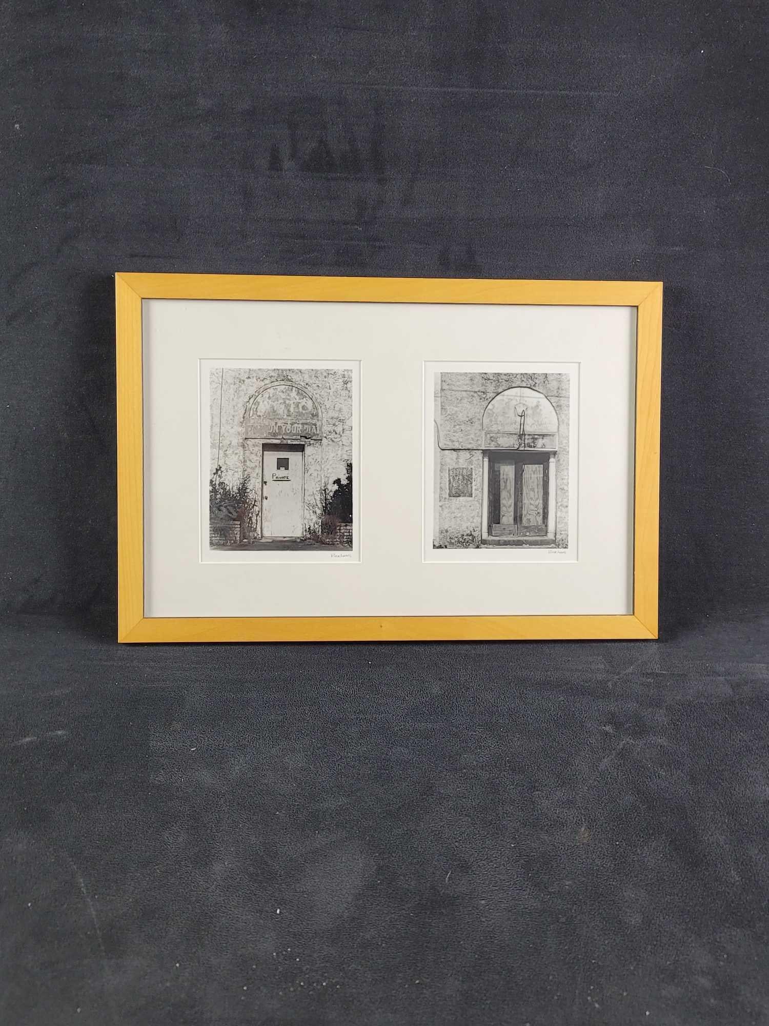 Doors Rick Lang Photo Black and White: A Black and white photo titled " Doors " is framed, matted, and each photo is signed. Set in a wood frame. In good condition, with no known damages. Approx. measures 17 1/4" x 11 1/2", weight is 2