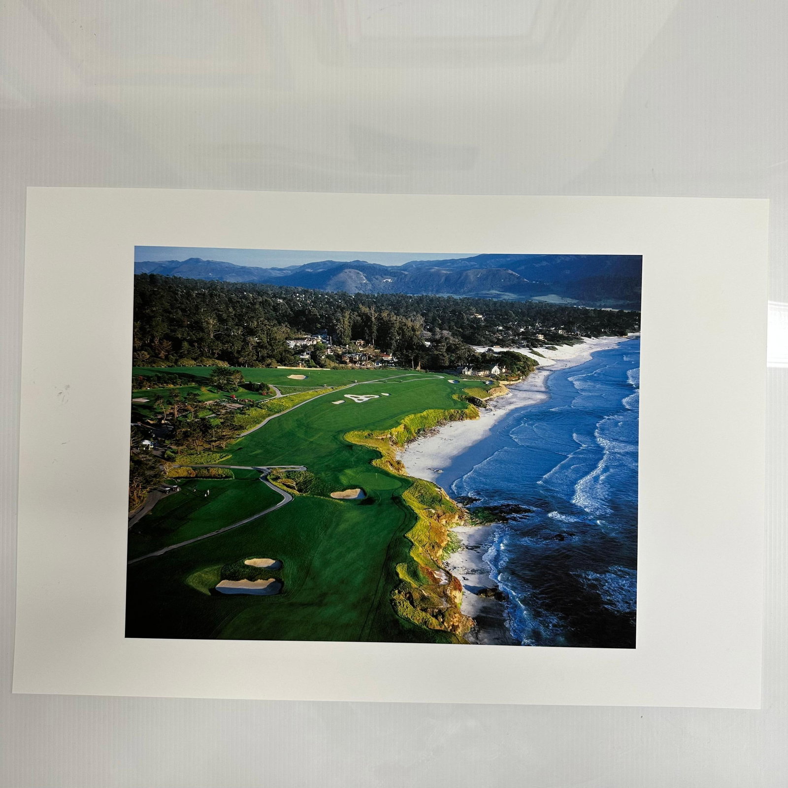 Pebble Beach Golf Links Aerial Coastal View Color Photo Print California: Aerial photographic print of Pebble Beach Golf Links, capturing the dramatic California coastline and world-famous fairways. Vibrant greens and blue ocean tones make this an ideal display for golf or 