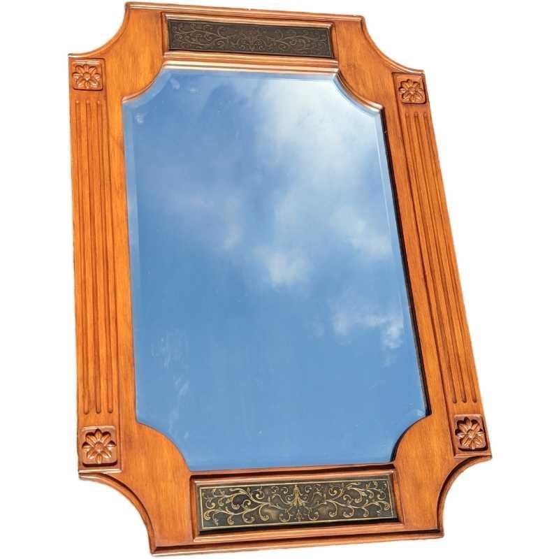 Wooden 26" x 38" Floral Wall Mirror: Wooden Floral Wall Mirror. Its maker and date of creation are unknown. Has a nice floral border and would work well in any room. The wall mirror is approx 26" x 1" x 38" and it weighs 20lbs. The