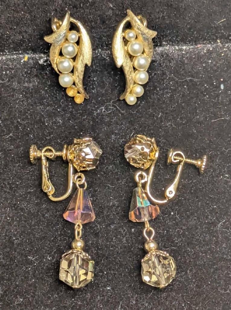 Vintage Coro Faux Pearls And Crystal Dangle Gold Tone Clip On Earrings: Vintage Coro Faux Pearls And Crystal Dangle Gold Tone Clip On Earrings. This lot includes: (1) Set Of 1960s Gold Tone Clip On Golden Crystal Dangle Earrings With Aurora Borealis Beads. Each is approx 