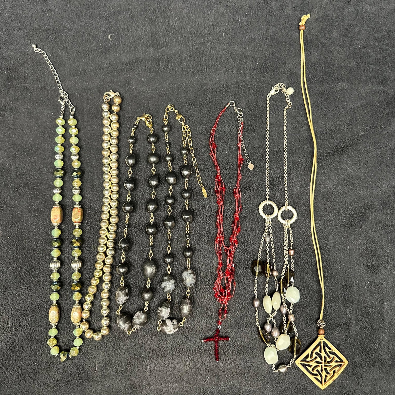 Costume Jewelry Necklace Set Lot of Seven Necklaces Q20: A collection of seven costume necklaces with a variety of types and materials. A few are broken, missing pieces. These items are in good pre-owned, previously displayed condition with minor wear and s