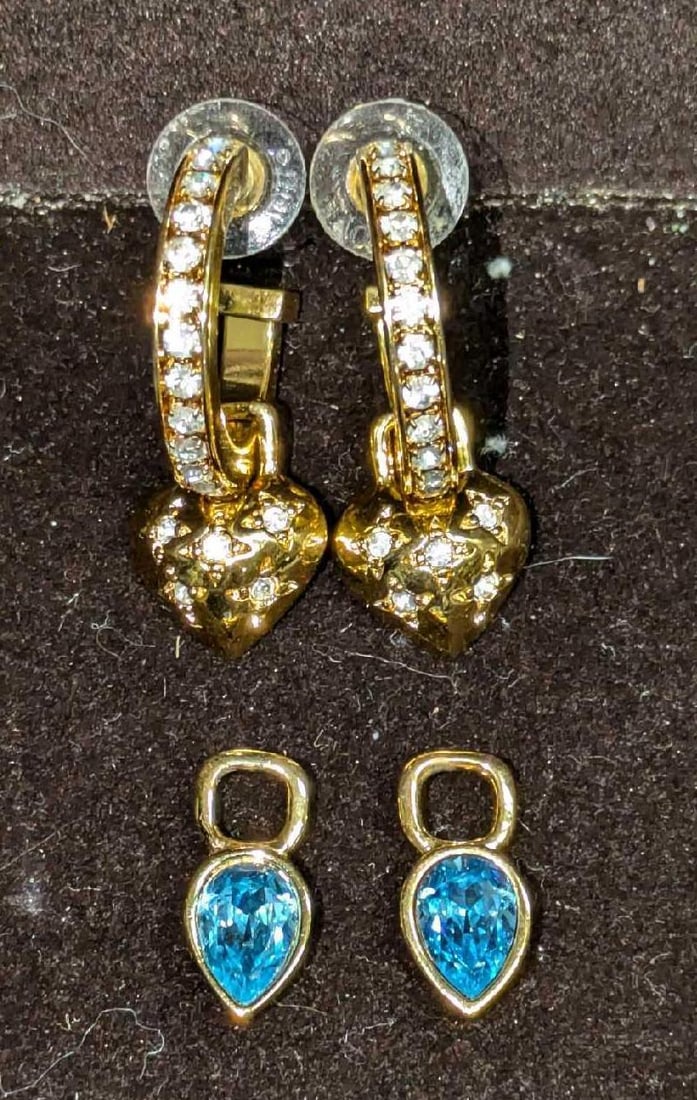 Vintage Avon Interchangeable Gold Tone Earrings: Vintage Avon Interchangeable Gold Tone Earrings. Set Of Avon Gold Tone Rhinestone Earrings. The hearts can be switched out for the blue crystal hearts. Each is approx 1/2" x 1" x 1 1/2". Th