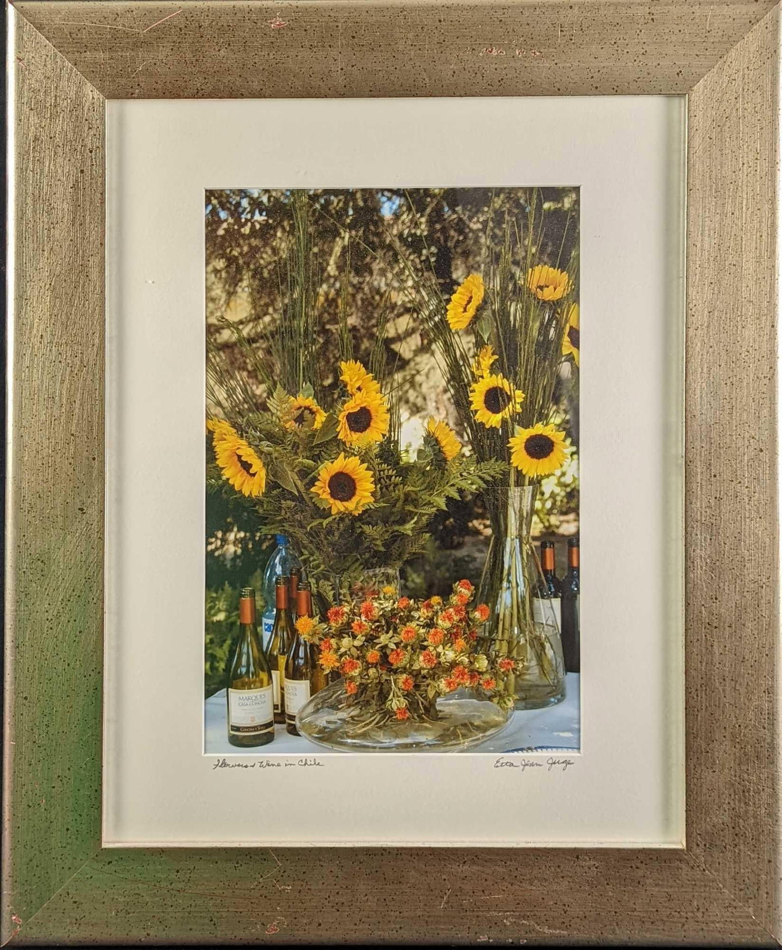 Framed Etta Jean Juge Flowers & Wine In Chile Photo: Framed Etta Jean Juge Flowers & Wine In Chile Photo. The framed photo is approx 18 1/2" x 1" x 22" and it weighs 5.5lbs. The photo/image is approx 9" x 13". The framed photo is