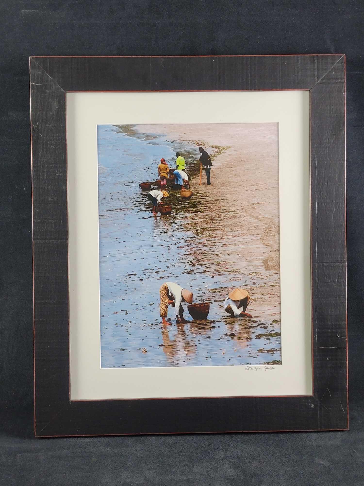 Etta Jean Juge Jimbaran Bay Beach Photograph Bali: The photograph is of the native people on Jimbaran Bay Beach. The photo was taken by Edda Jean Juge, who titled the piece "Cleaning Jimbaran Bay Beach". It is a lovely piece and in good condit