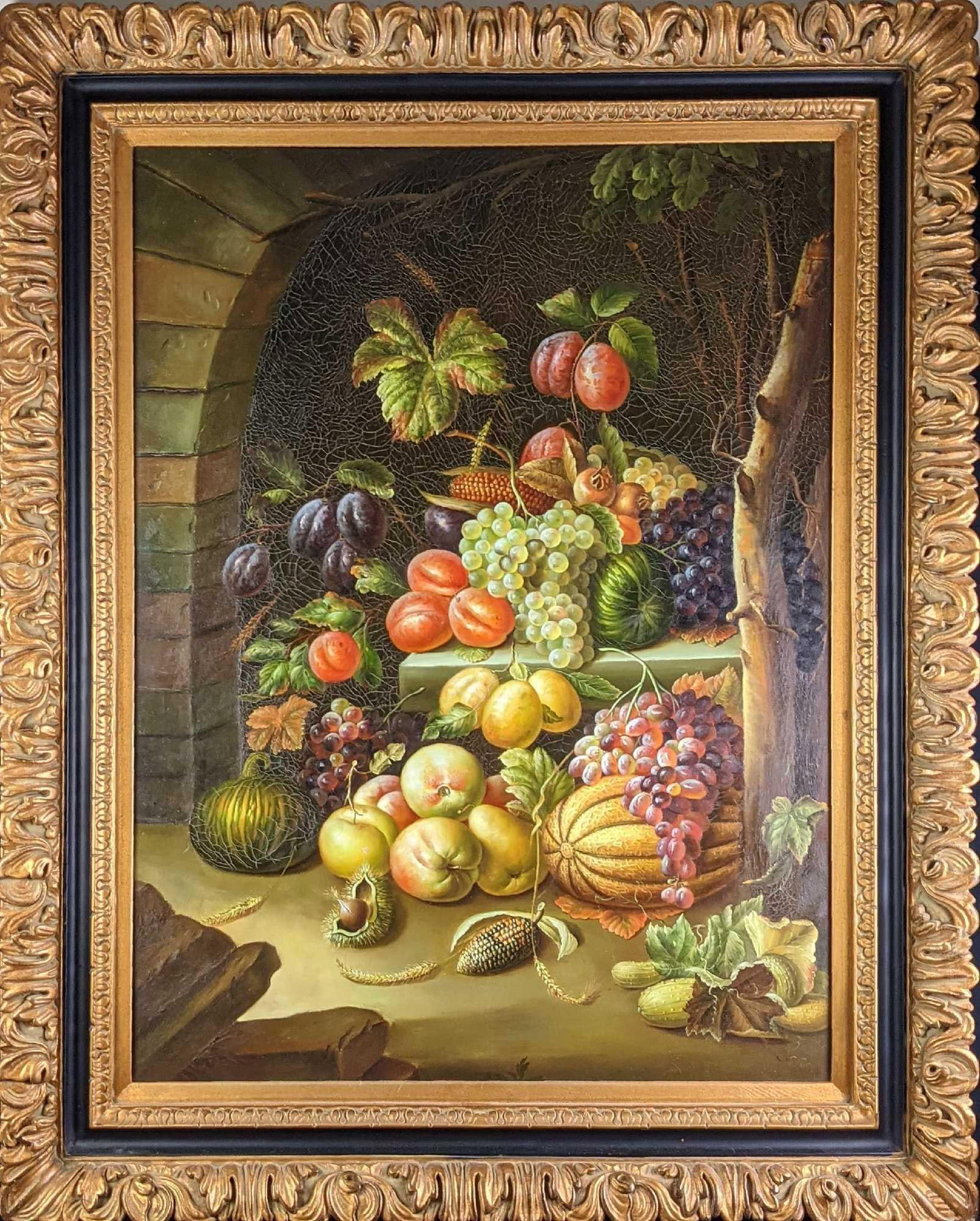 Large Framed Oil On Canvas Fruit And Veggies J: Large original oil on canvas of a classic scene of fruit and vegetables near what appears to be a stone arch. Original is signed on the bottom right. Framed original is approx 40 1/2" x 3 1/2"