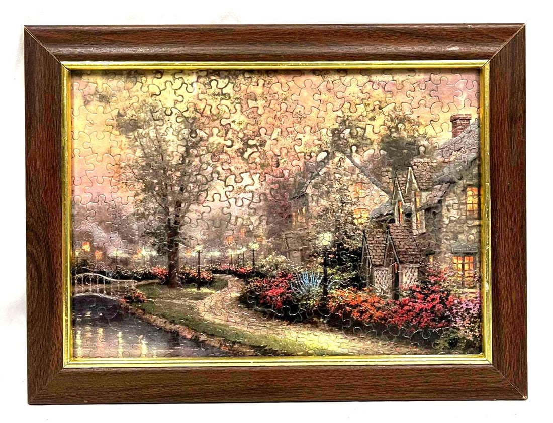 Framed Lamplight Lane Puzzle 300 Pieces: This lot contains Framed Lamplight Lane Puzzle 300 Pieces. The frame is approx 12 1/4" x 16 1/4" and altogether it weighs about 2.1lbs. Overall the Frame and Puzzle are in good used condition