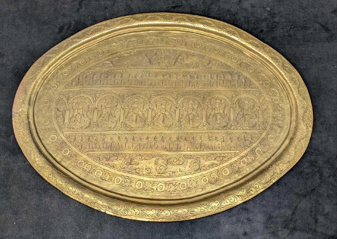Vintage Hanging Indian Hindu Gods Brass Oval Wall Platter: Vintage Hanging Indian Hindu Gods Brass Oval Wall Platter. The etched brass platter shows Hindu gods and animals. The maker and date of creation is unknown. Small hooks were later added to the back