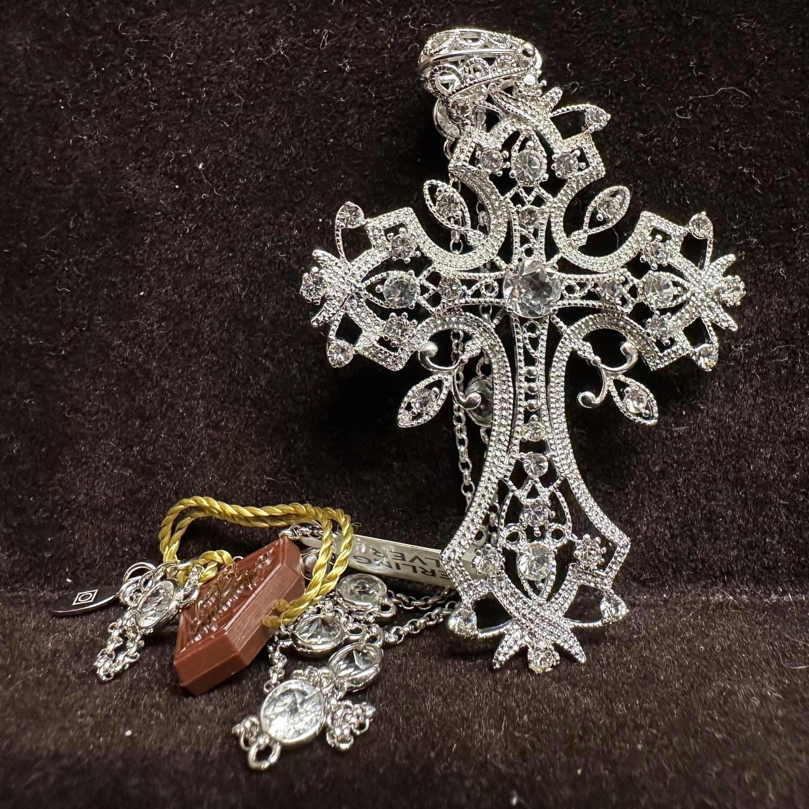 Sterling Silver Alexandra Gem CZ Accent Filigree Cross Necklace V89: This item is in good pre-owned, previously used/displayed condition with noticeable light wear and surface scratches. Please reference all photos for full details. This piece of jewelry has been teste