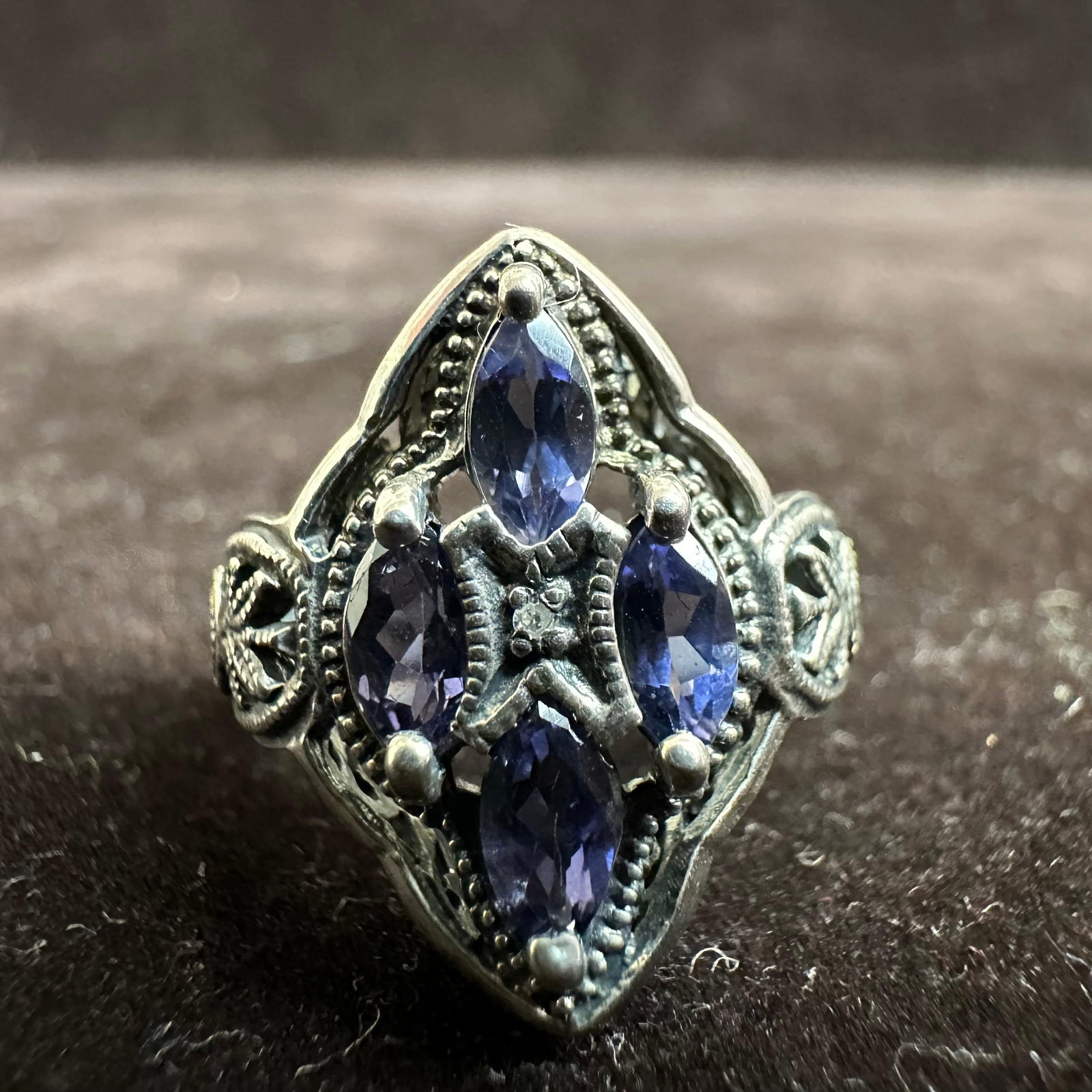 Tanzanite Blue Purple Stone Sterling Silver 925 Modernist Ring: This item is in good pre-owned, previously used/displayed condition with noticeable light wear and surface scratches. Please reference all photos for full details. This piece of jewelry has been teste
