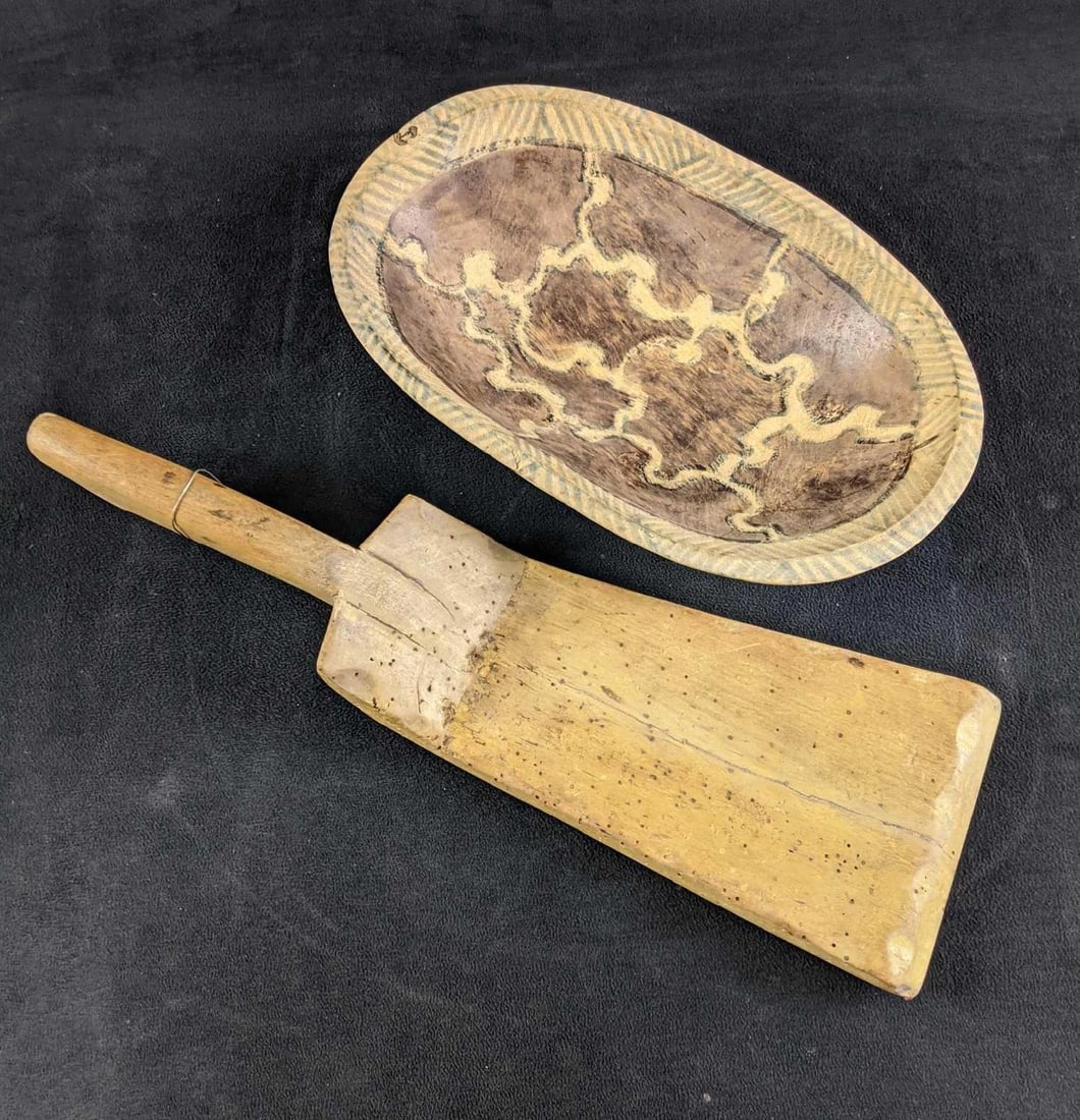 Wooden Bowl and Server: Wooden Bowl and Server This lot comes with two wood-carved items. One item is a decorated bowl and the other is a server. Both are made out of wood and in vintage condition with some paint loss.