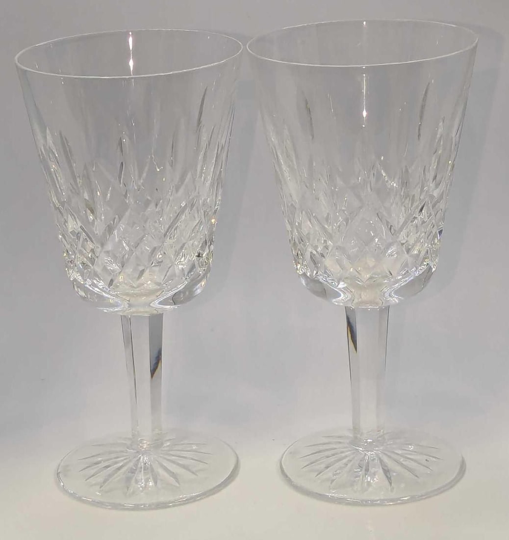 2 Waterford Crystal Lismore White Wine Glasses A: 2 Waterford Crystal Lismore White Wine Glasses A. Each is approx 3 3/8"x3 3/8" x 6 7/8" and the total weight is 1.76lb. The glasses have no chips or cracks.