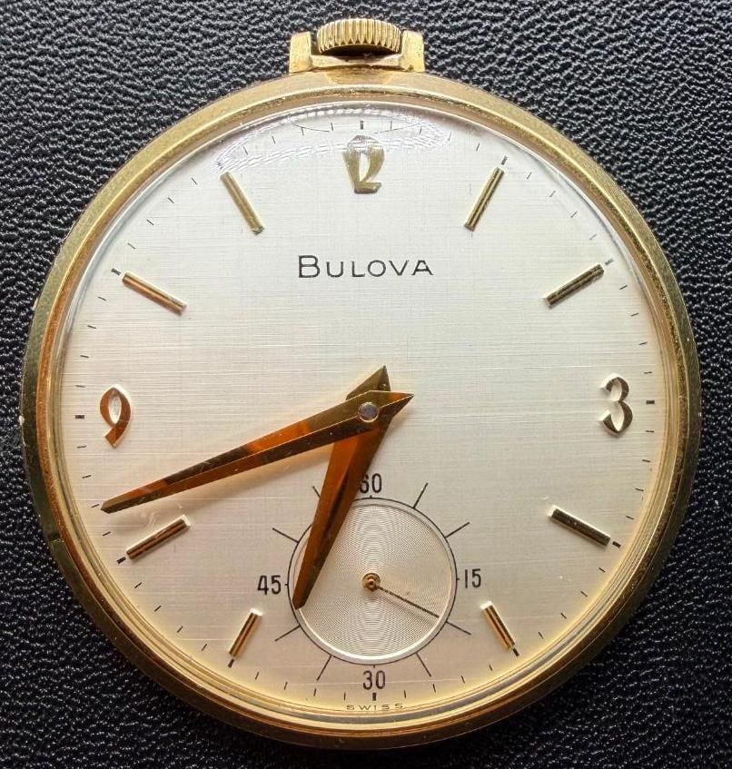 Bulova Pocket Watch Engraved 10k RGP: This piece of jewelry has been tested and researched prior to listing. Please view all our pictures they are part of our description. DETAILS: Metal - 10k Plated Base Metal Color - Gold Stones - none 