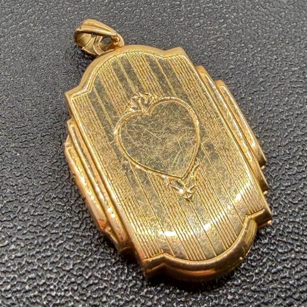 14k Gold 1" Hinged Locket: This piece of jewelry has been tested and researched prior to listing. Please view all our pictures they are part of our description. DETAILS: Metal - 14k Gold Color - Yellow Gold Stones - none Hallma
