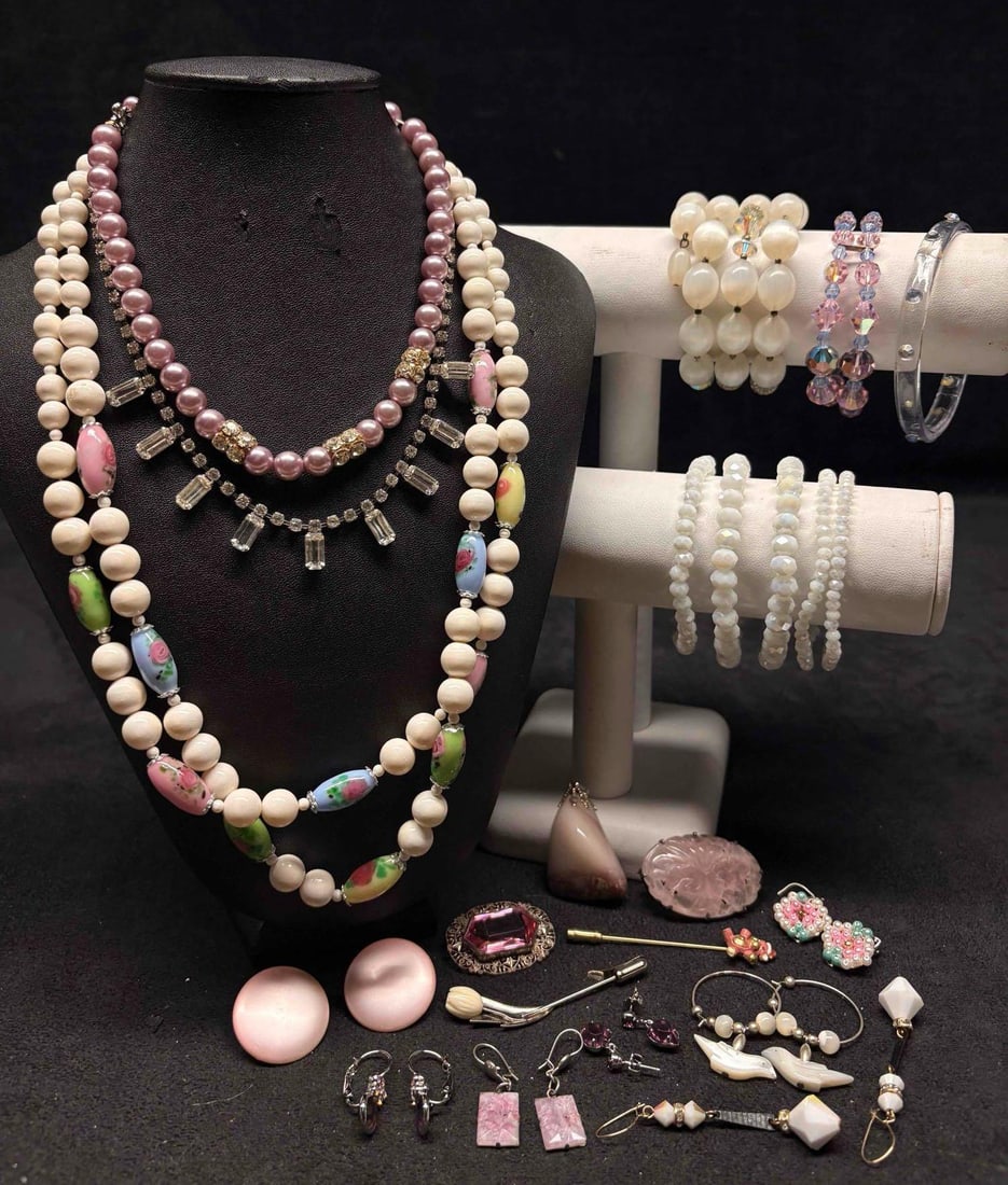 23pc Pastel Mid Century Meadow Costume Jewelry Collection: This lot contains 23 pieces of pre-owned costume jewelry, paired together in a stylized set. Each piece is in good conditions, with wear and tear over the years visible on some of the jewelry. Please 