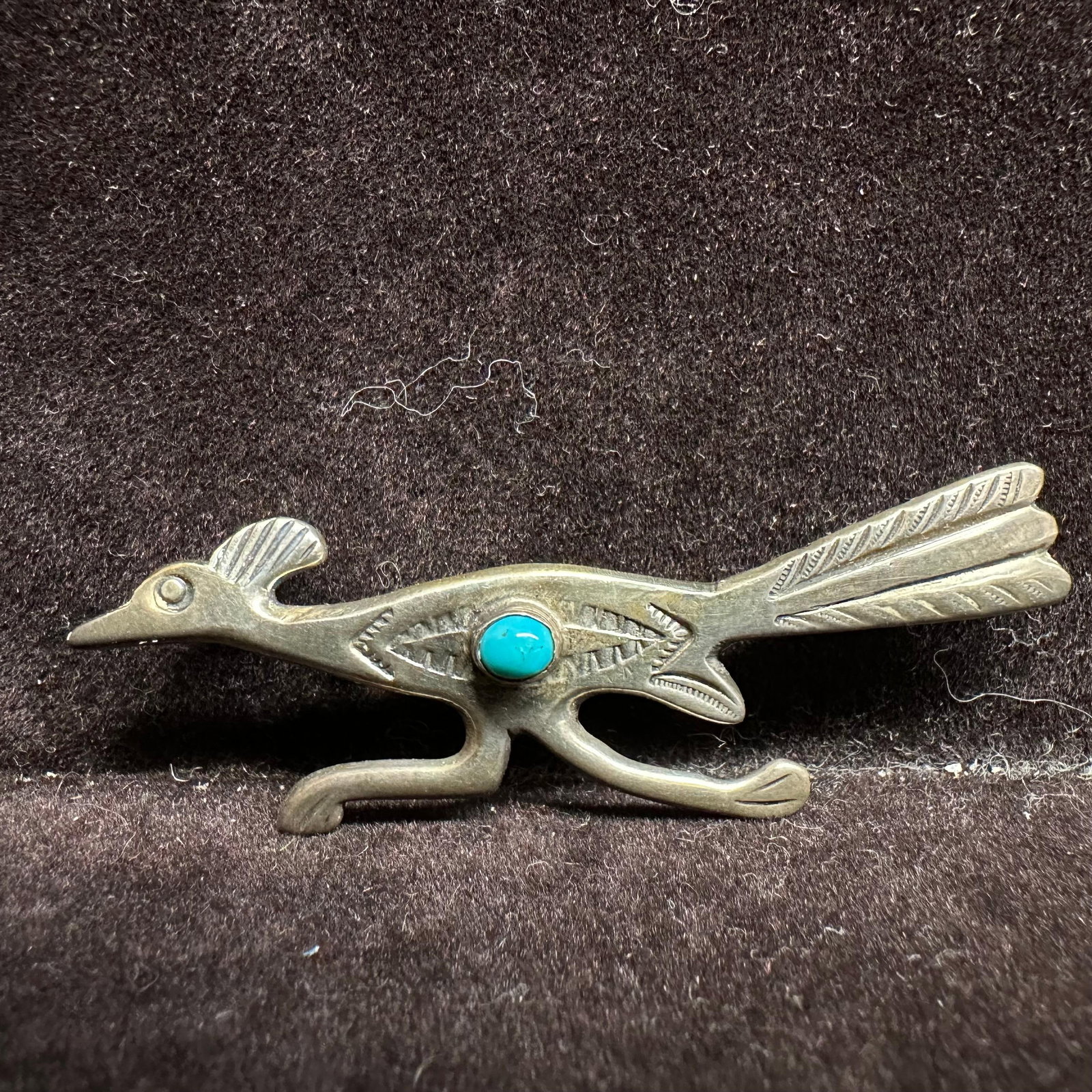 Turquoise Accent Stone Roadrunner Navajo Style Silver Brooch: This item is in good pre-owned, previously used/displayed condition with noticeable light wear and surface scratches. Please reference all photos for full details. This piece of jewelry has been teste