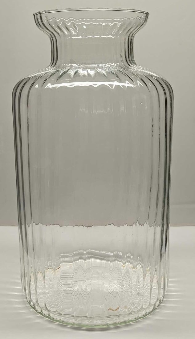 Vintage 16" Glass Clear Floor Vase: Vintage 16" Glass Clear Floor Vase. This is approx 9" x 9" x 16" and it weighs 4.30lbs. The maker and date of creation is unknown. The vase has some markings and residue inside. There is a small imper