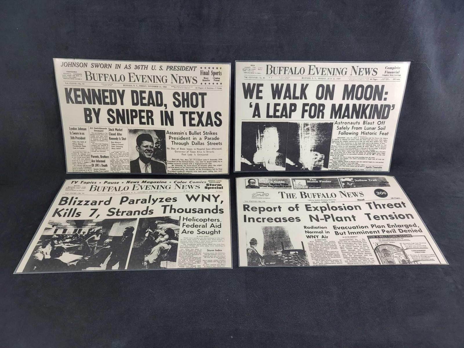 The Buffalo News 1960 and 1970 News Worthy Placemats: This lot contains 4 placemats of the Buffalo Evening News: November 22, 1963 Kennedy Dead July 21, 1969 We Walk on the Moon January 29, 1977 Blizzard Paralyzes WNY April 1, 1979 Explosion Threat