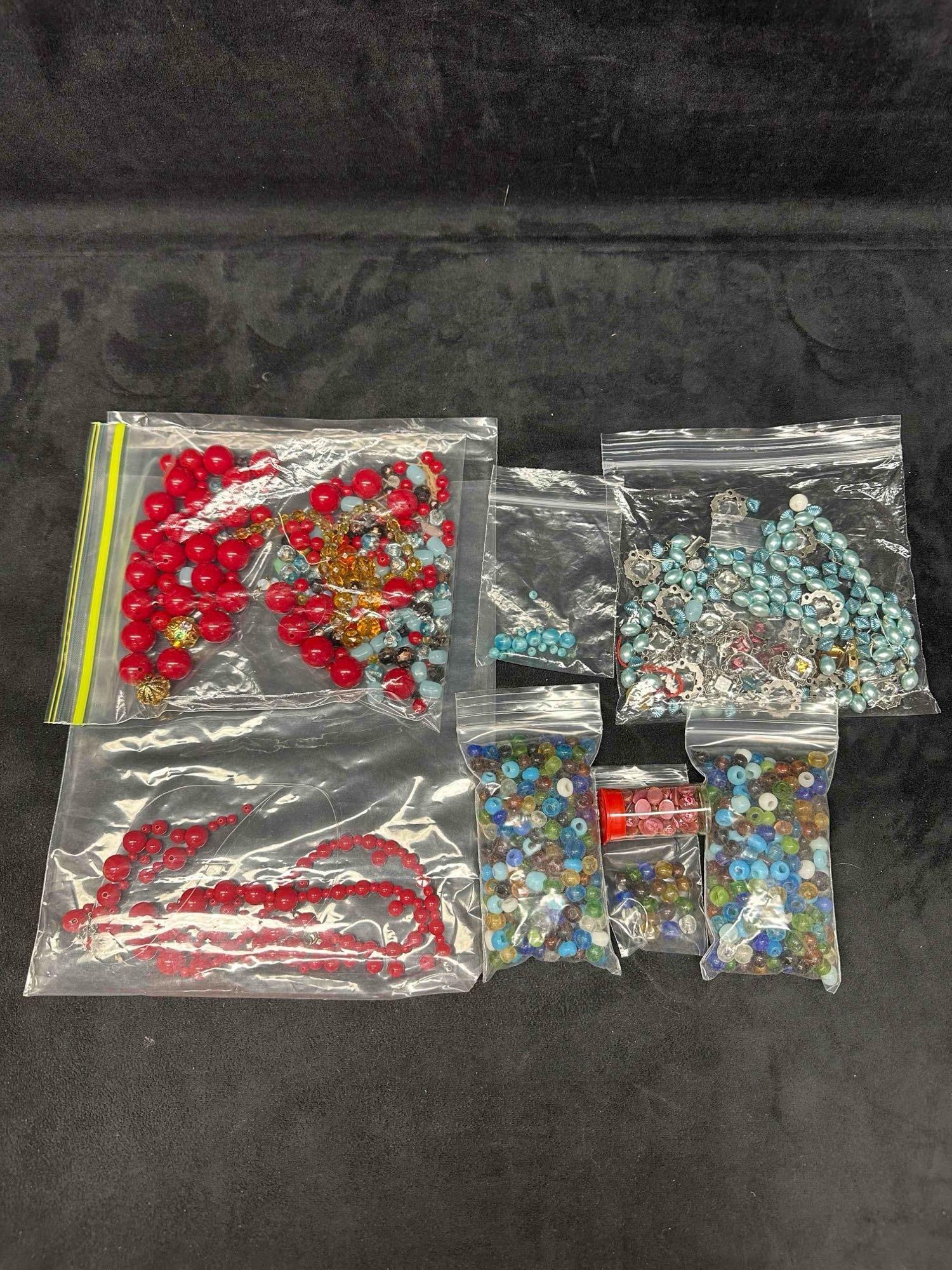 Collection of Costume Jewelry Beads Set of 100 Plus Pieces: Collection Jewelry Beaded Piece Set Lot of 100 Pieces. Over 100 multi colored beads and pieces with beautiful painted designs on each. The beads feature various accents. Includes some broken necklaces