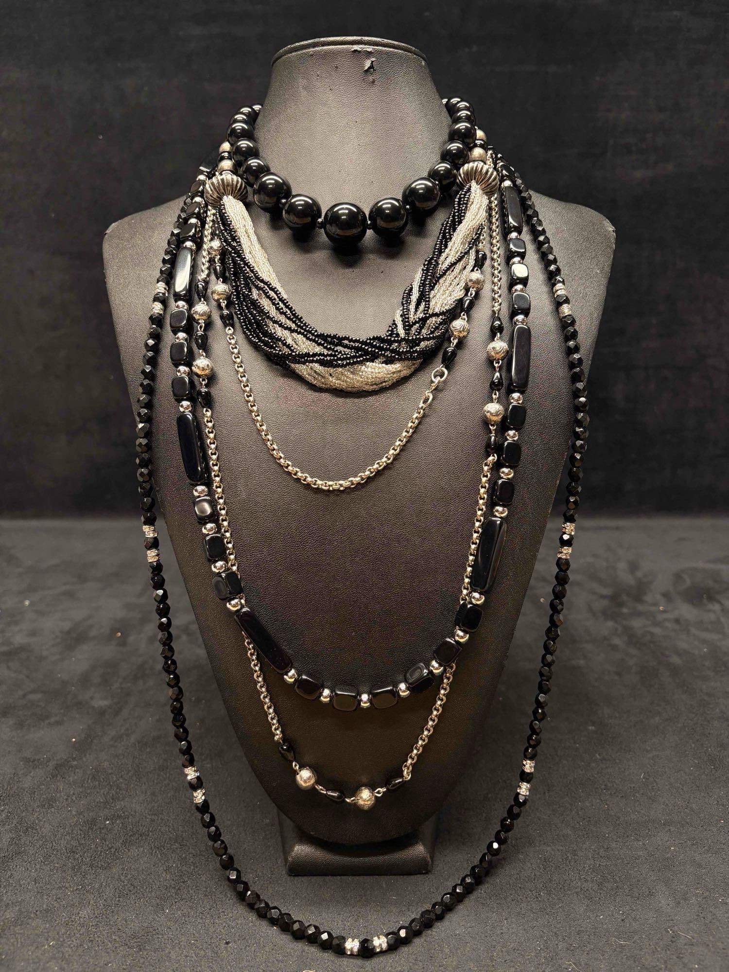 5pc Monochromatic Necklace Lot: This lot consists of 5 pre-owned costume jewelry necklaces with typical wear from use. Please review images for context of the lots visual conditions. APPROX WEIGHT: 9.1 OZ