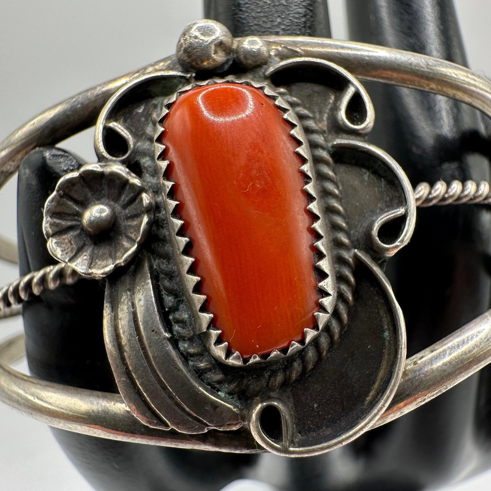 Red Coral Foliate Motif Native American Southwestern Style Silver Bracelet: This item is in good pre-owned, previously used/displayed condition with noticeable light wear and surface scratches. Please reference all photos for full details. This piece of jewelry has been teste