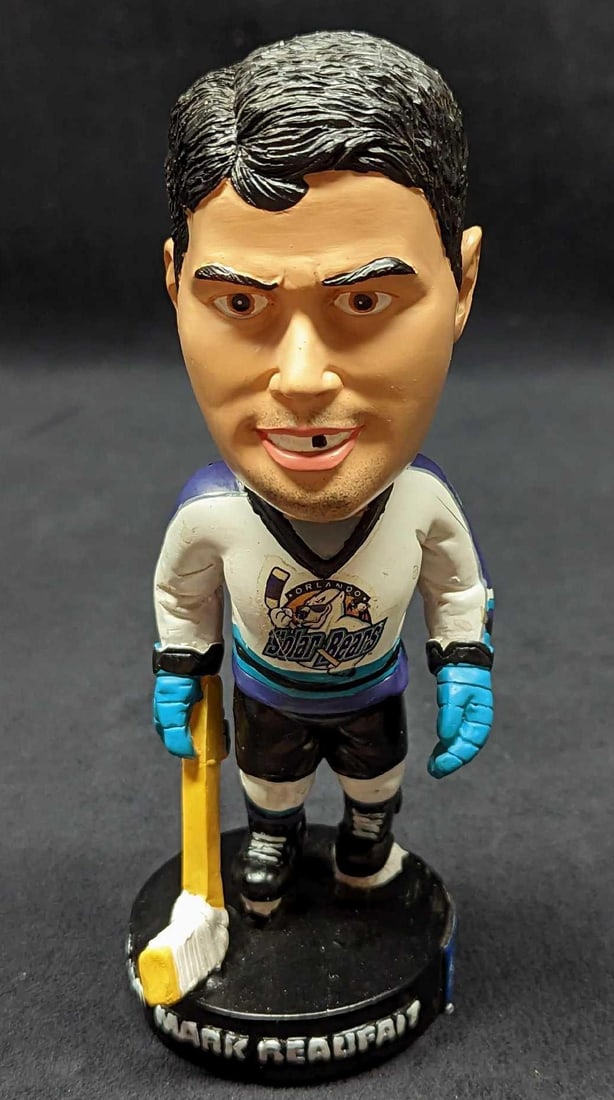 Orlando Solar Bears Mark Beaufait Bobble Head: Orlando Solar Bears Mark Beaufait Bobble Head. Made of hand-painted resin. Is approx 2 3/8" x 2 1/4" x 6 5/8". Is in a good, unused condition with some markings due to storage. It comes in its or