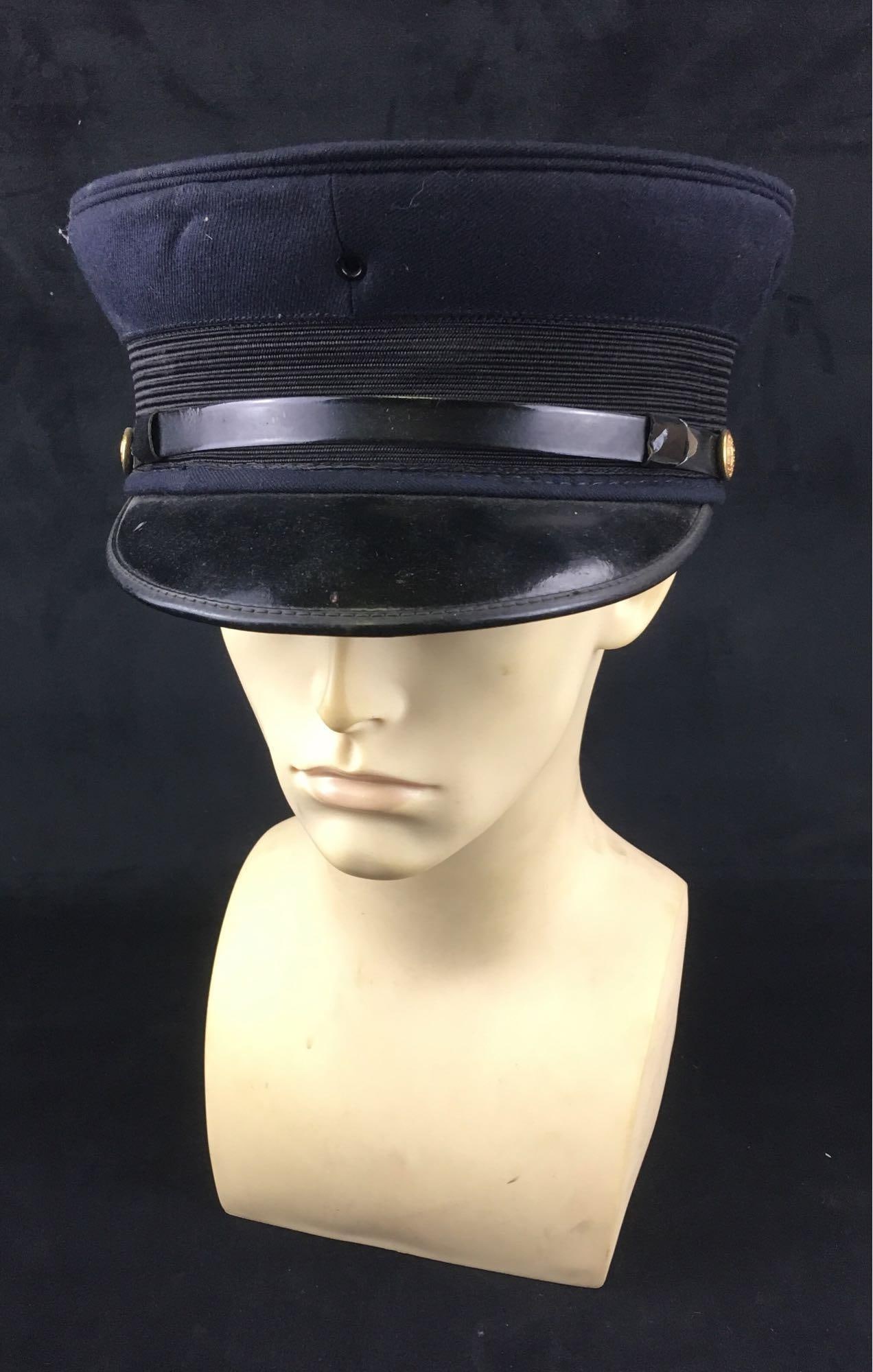 Vintage Wentworth Head Master Model Fireman's Cap: Vintage Wentworth Head Master Model Fireman's Cap; this fireman's cap is marked size 7 and marked with the union label. It shows a front band fastened with brass buttons marked "FD". This cap is