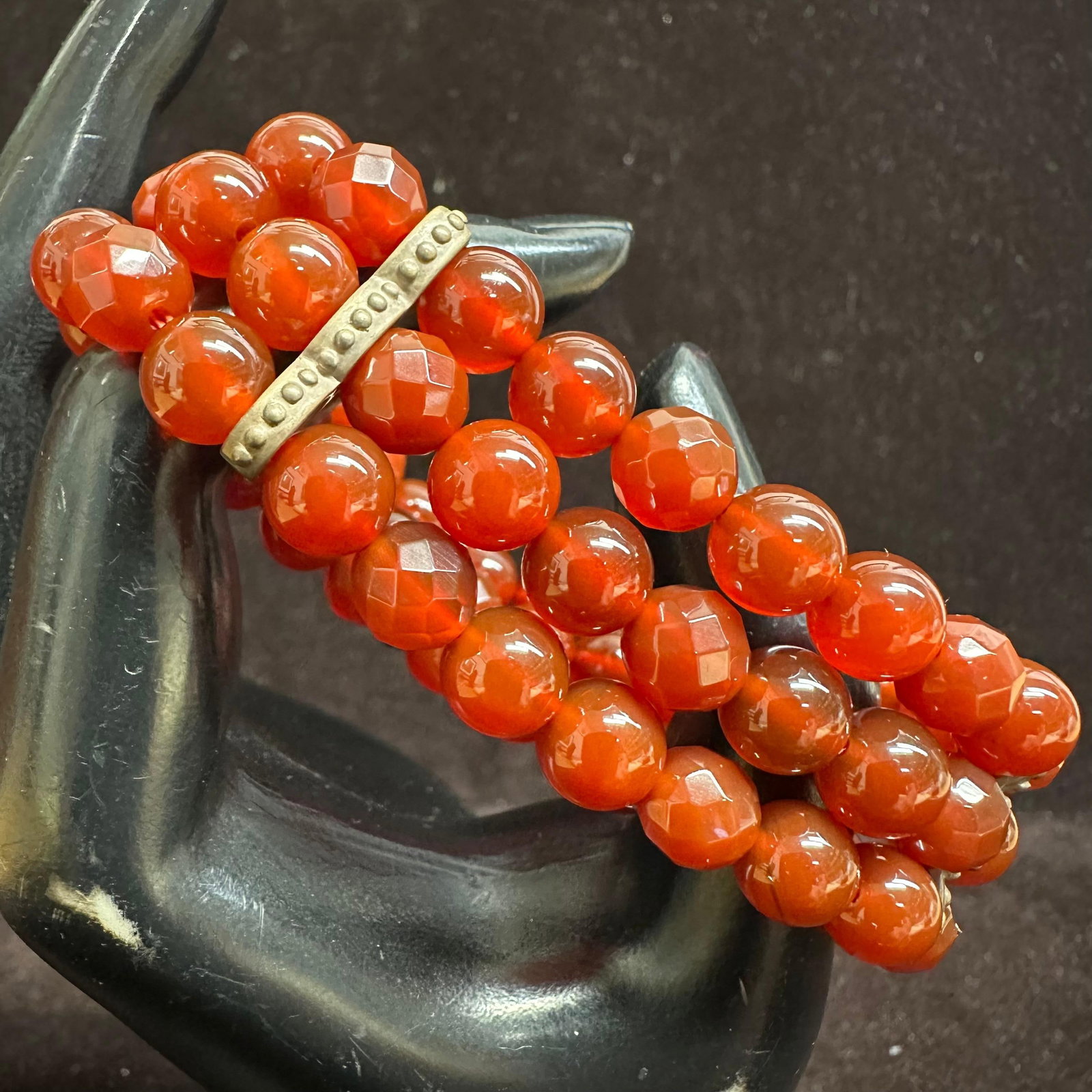 Triple Strand Faceted Carnelian Stone Bead Sterling Silver Bracelet: This item is in good pre-owned, previously used/displayed condition with noticeable light wear and surface scratches. Please reference all photos for full details. This piece of jewelry has been teste