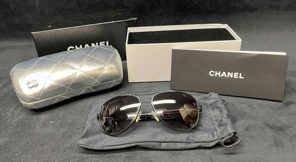 Chanel Black Metal Frame Aviator Sunglasses- 4179 In Original Case & Box: This lot contains a pair of Chanel Black Metal Frame Aviator Sunglasses- 4179 In Original Case & Box. The box is approx 7 1/4" x 3 1/4" x 3". Total weight is approx 13.2oz. Overall the Chanel sunglass