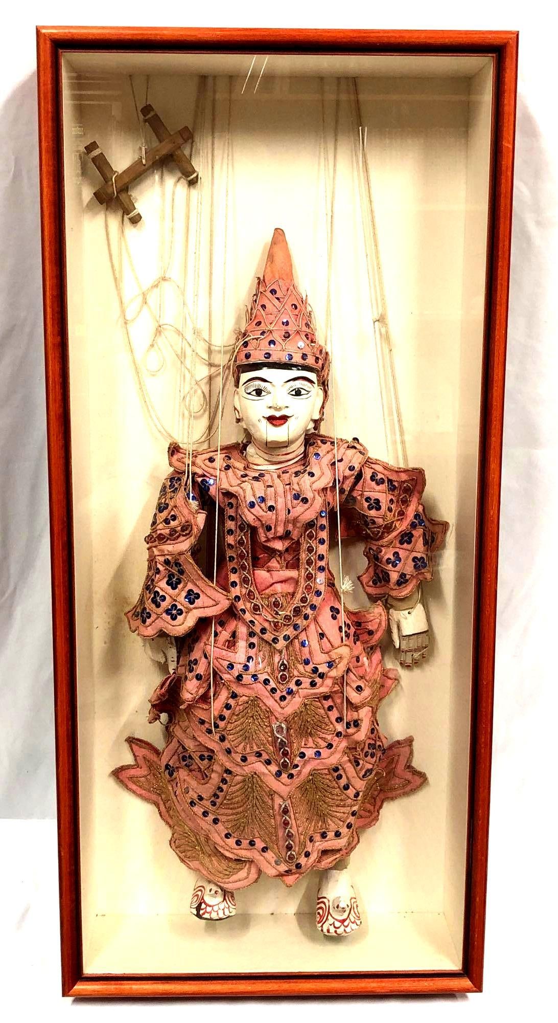 Vintage Thai Marionette String Puppet Shadow Box: Vintage Thai Burmese Marionette String Puppet in Shadow Box. Puppet made from hand-painted carved wood and elaborately embellished fabric. Shadow Box made from wood and glass with fabric lining. 