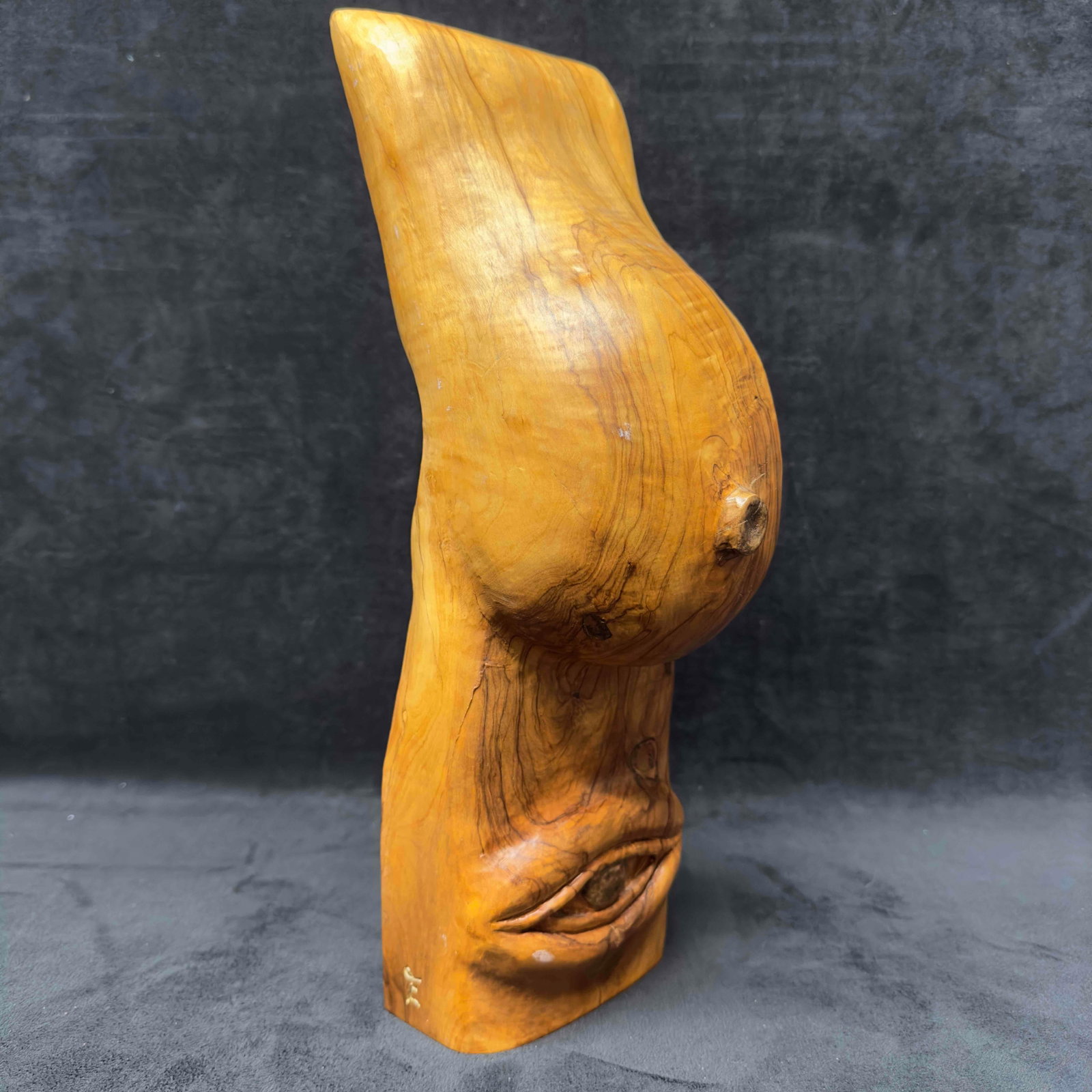 Wooden Sculpture Hand Carved Pregnant Belly Third Eye Motherhood Pregnancy Wood Statue: Wooden Sculpture Hand Carved Pregnant Belly Third Eye Motherhood Pregnancy Wood Statue. The wooden statue has a "E" signature on one side. The wooden statue represents a torso pregnant belly w