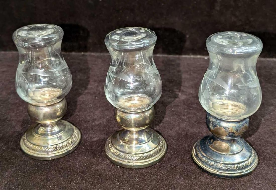 3 Vintage Newport Sterling Silver Salt & Pepper Shakers: 3 Vintage Newport Sterling Silver Salt & Pepper Shakers. Is marked "Quaker Hurricane" and is weighed. Each is approx 1 1/2" x 1 1/2" x 3 1/4". The top can be removed from the sterling silver base. The