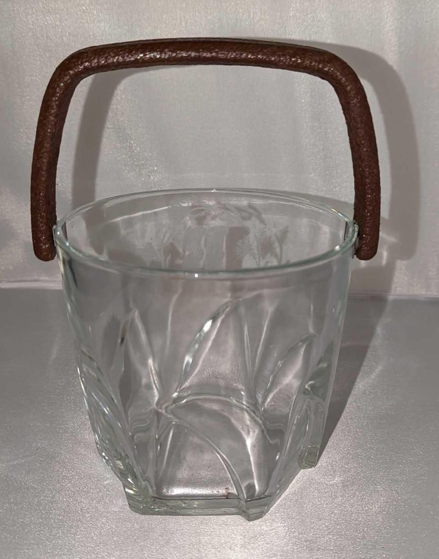 Vintage French Glass Ice Bucket: Vintage French Glass Ice Bucket. Is marked with a "B" on the sides. The ice bucket is also marked by its maker on the bottom along with France. We could not make out the maker's name. The bucket is ap