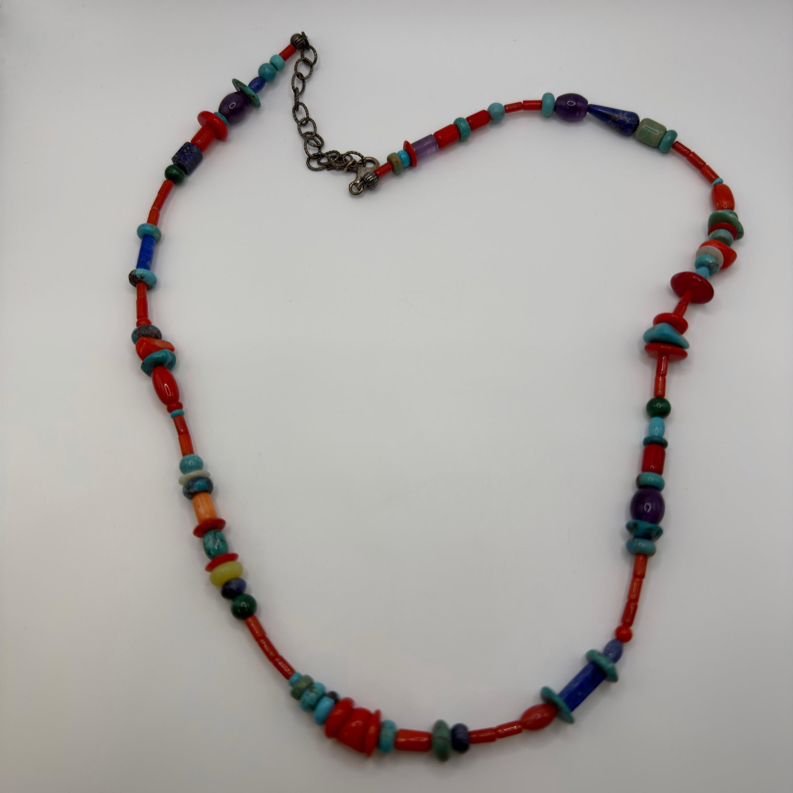 American West Relios Vibrant Multi-Stone Turquoise Coral Lapis Sterling Accents and Clasp: This item is in good pre-owned, previously used/displayed condition with noticeable light wear and surface scratches. Please reference all photos for full details. This piece of jewelry has been caref