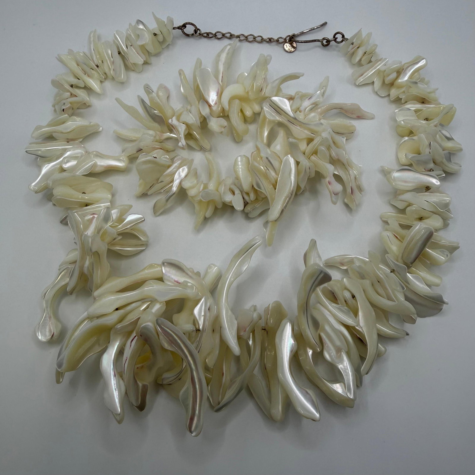 Mother of Pearl Irregular Shell Sticks Sterling Necklace and Bracelet Jewelry Set: This item is in good pre-owned, previously used/displayed condition with noticeable light wear and surface scratches. Please reference all photos for full details. This piece of jewelry has been caref