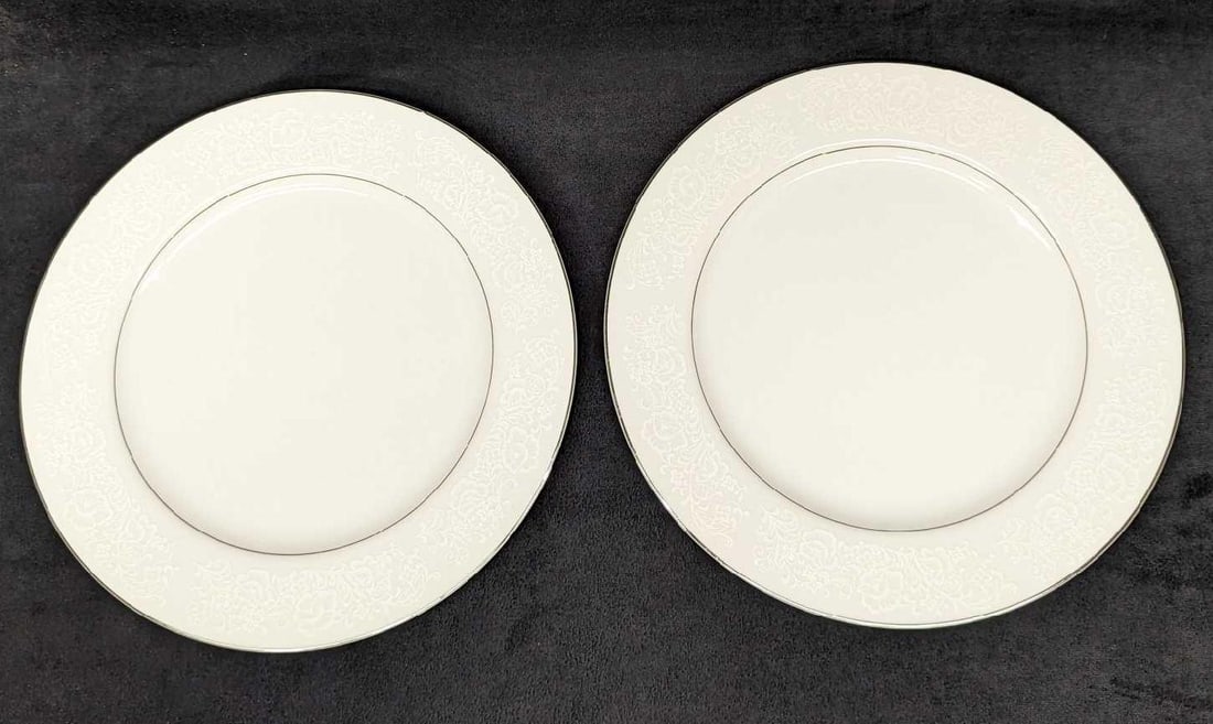 2 Retired International Fine China Juliet Dinner Plates E: 2 Retired International Fine China Juliet Dinner Plates E. Each plate is approx 7 5/8" x 7 5/8" x 3/4" and the total weight is 2.49 lbs. The plates do not have any chips or cracks, and there are some 