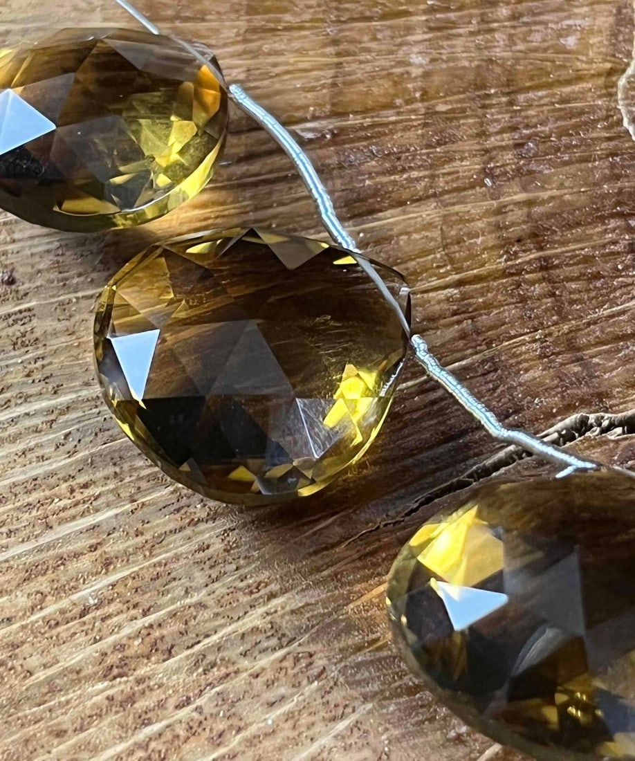 Honey Quartz Large Faceted Beads Teardrop 7ct: Honey Quartz Large Faceted Beads Teardrop 7ct Here is a lovely lot of honey quartz for that jewelry artist out there. Also, a great set to purchase and have a jeweler design a one-of-a-kind piece.