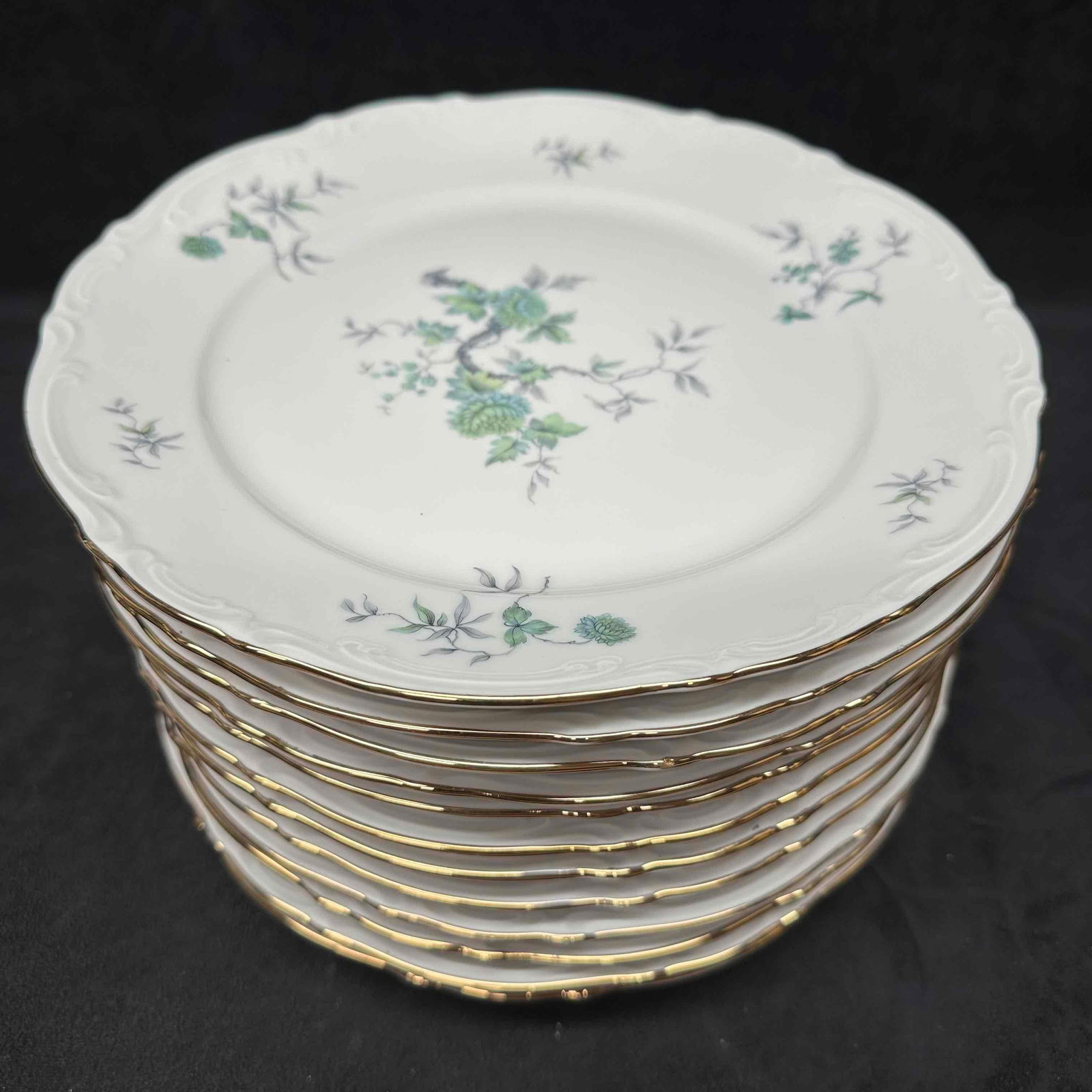 Green Ming Mitterteich Bavaria Germany Twelve Dinner Plate Set Gold Toned Trim: Light wear noticed along the bottom of each piece, no chips, cracks, or breaks in the porcelain. This set includes twelve (12) dinner plates with floral design. These items are in good pre-o